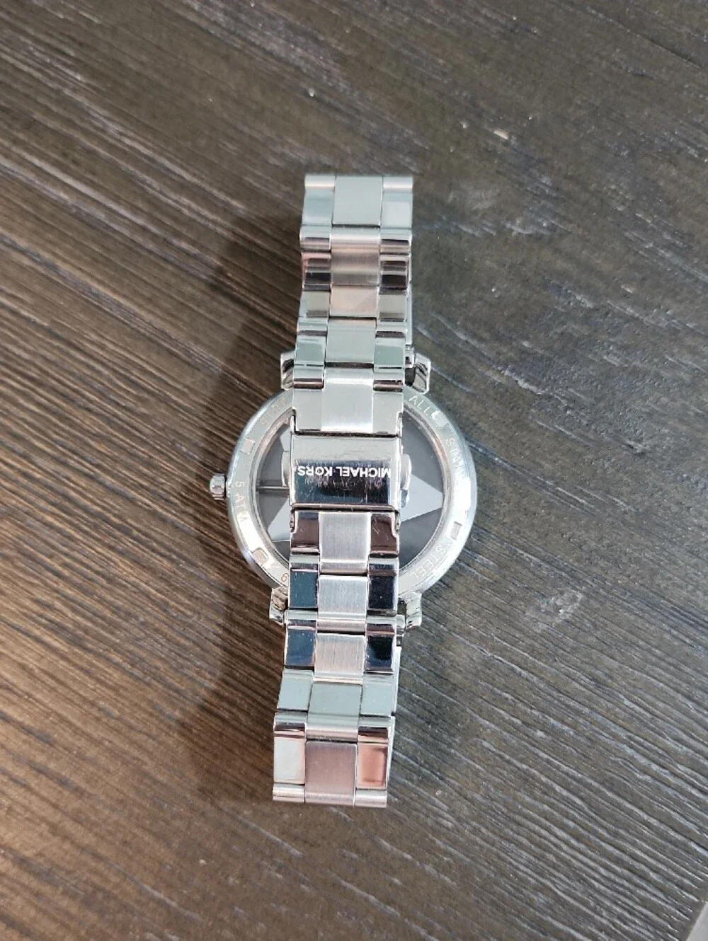 Michael Kors Silver Watch with Rose Gold Star Dial and Crystal Accents
